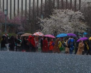 Ordain women supporters in the rain outside the Conference Center in Aprirl 2014