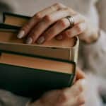 woman holding books