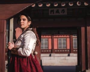 Blogger posing in traditional Korean dress at a Korean traditional palace