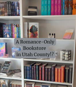 Bookshelf with romance novels and book related merchandise from Lagg Bookstore in Lehi, Utah